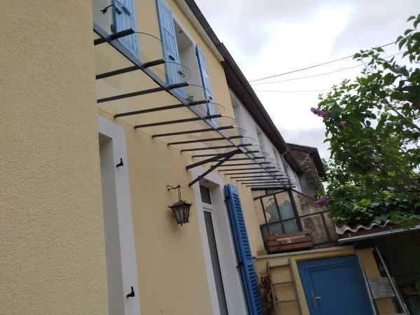 Remplacement vitrage marquise